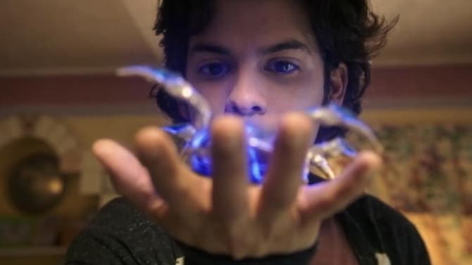 See How BLUE BEETLE Star Xolo Maridueña Suits Up As The Titular Hero in a Behind-The-Scenes Look!